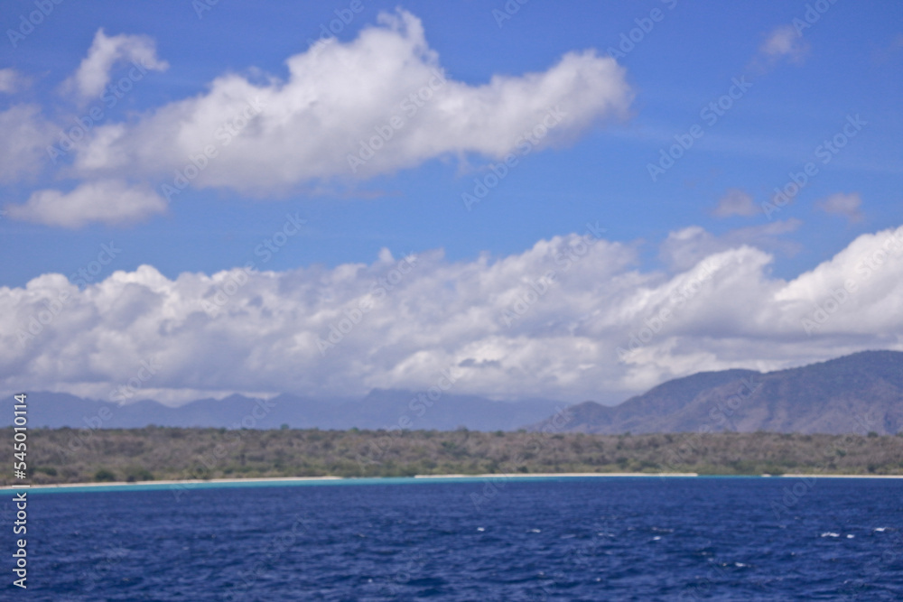 Tropical Island view in the sea and blue sky