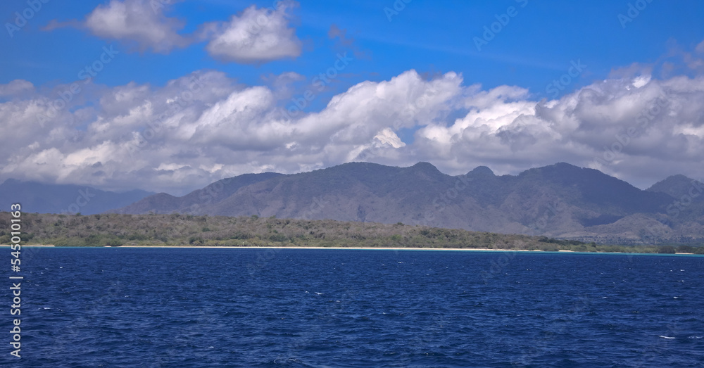 Tropical Island view in the sea and blue sky