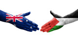 Handshake between Palestine and Australia flags painted on hands, isolated transparent image.