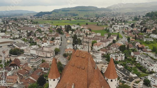 Thun Castle Switzerland. Thun Castle is a castle in the town of Thun, in the Swiss canton of Bern. It was built in the 12th century and today houses the Thun Castle Museum. (aerial photography) photo