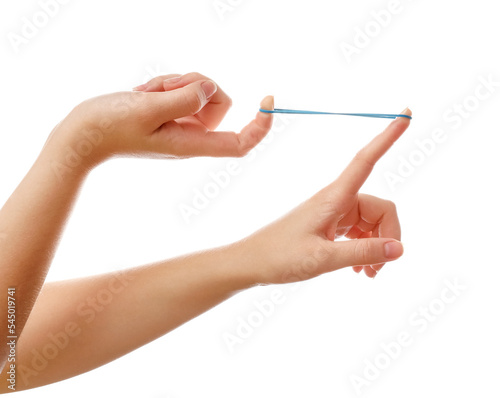 Woman with blue rubber band on white background