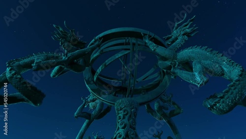 Under the night sky, low-angle shot of the sculpture of the seismograph invented by Zhang Heng of the Eastern Han Dynasty photo