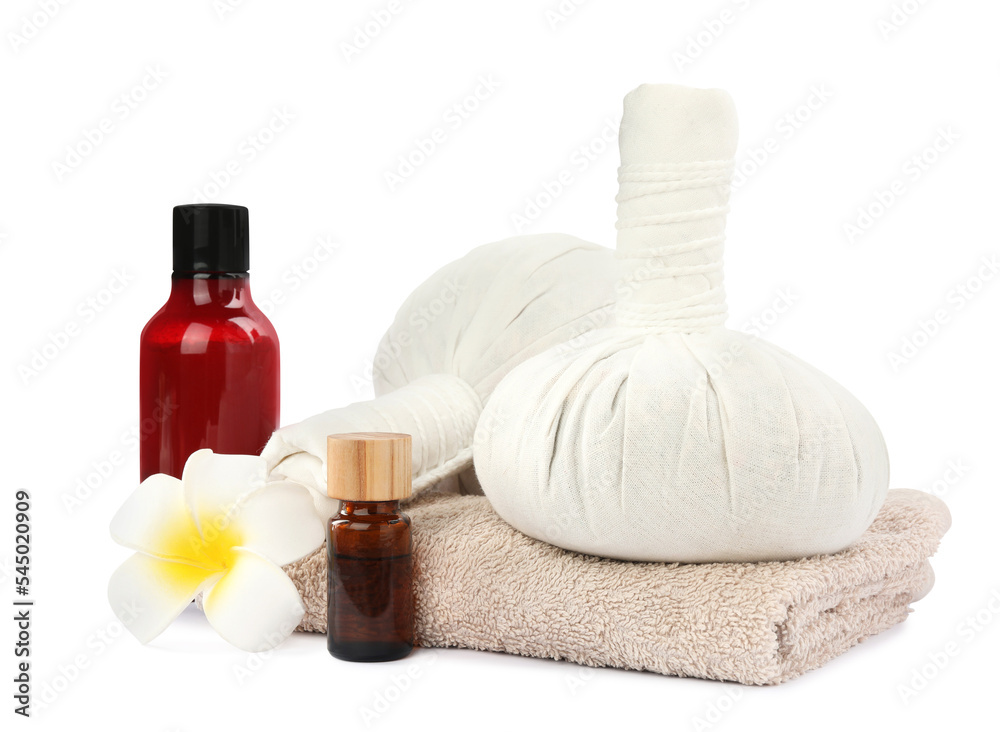 Herbal massage bags, towel and cosmetic products on white background. Spa supply