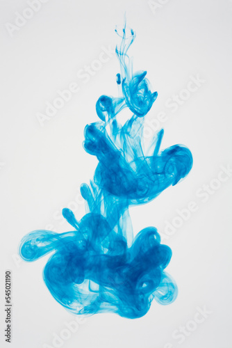 blue ink dissolving in water