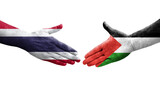 Handshake between Palestine and Thailand flags painted on hands, isolated transparent image.