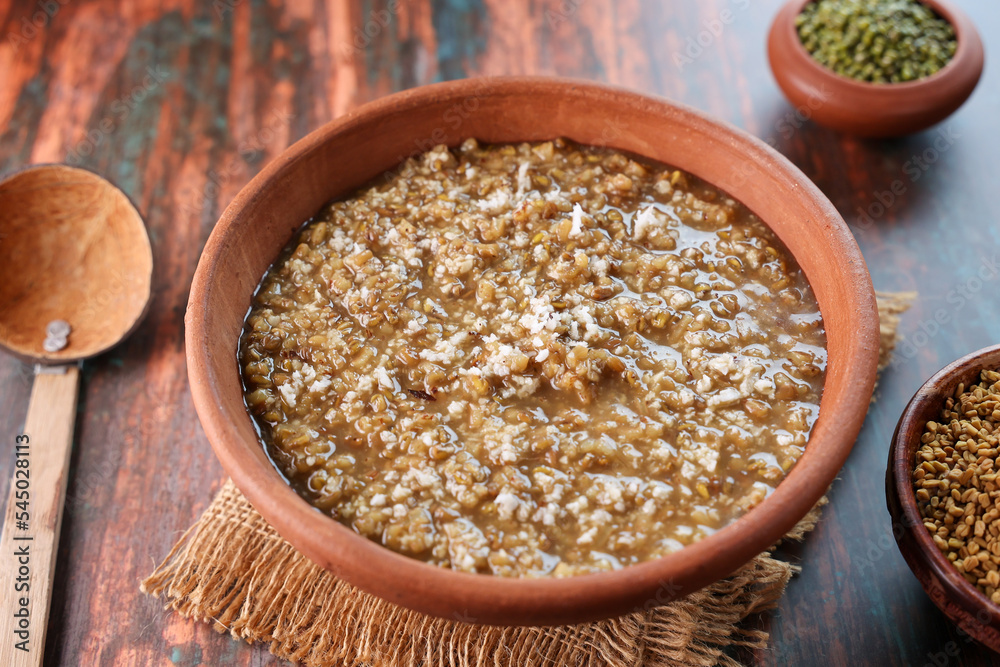 Fenugreek seeds porridge gruel soup or Uluva Kanji navara kichadi. Monsoon Post Delivery Care Diet for lactating mothers. Health drink Kerala India. marunnu kanji Ayurveda porridge kanji Fenugreek seeds porridge gruel soup or Uluva Kanji navara kichadi. Monsoon Post Delivery Care Diet for lactating mothers. Health drink Kerala India. marunnu kanji Ayurveda porridge kanji
