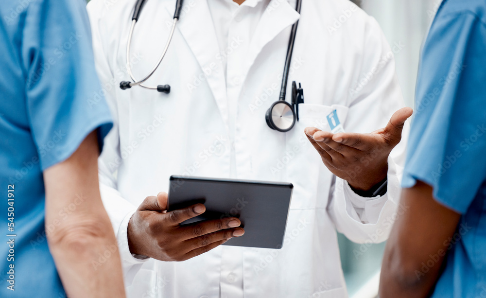 Digital tablet, teamwork and team of doctors planning a medical strategy together in the hospital. Collaboration, technology and closeup of a group of healthcare workers working on a mobile device. Digital tablet, teamwork and team of doctors planning a medical strategy together in the hospital. Collaboration, technology and closeup of a group of healthcare workers working on a mobile device.