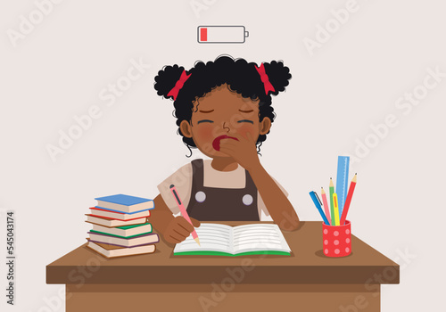 cute little African girl yawning feeling sleepy while studying doing homework on the desk