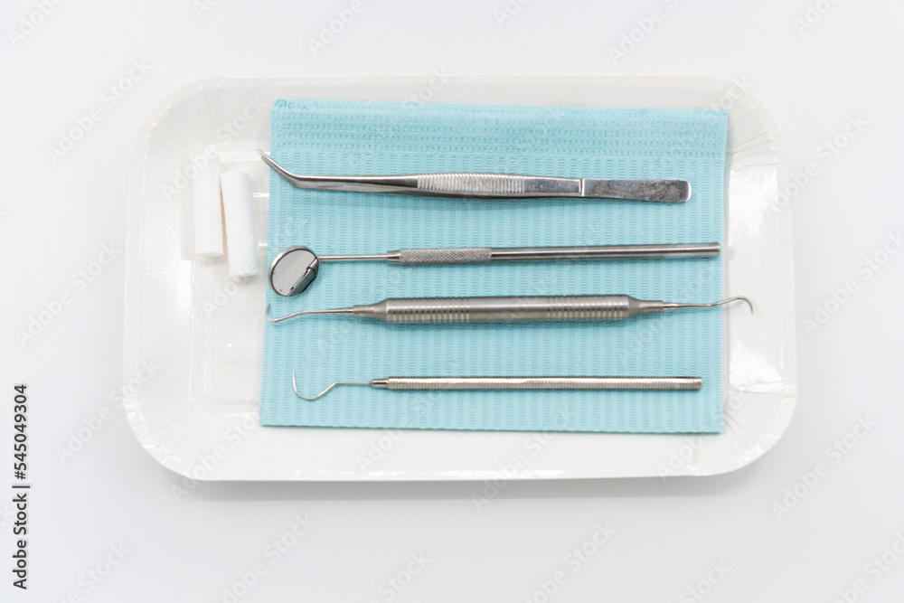 Professional dental instruments on white background Stock Photo | Adobe