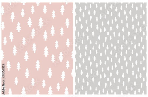Simple Infantile Style Christmas Trees Seamless Vector Patterns. Winter Forest Print. Abstract White Pines on a Pastel Pink and Light Gray Background. Christmas Tree Repeatable Design.