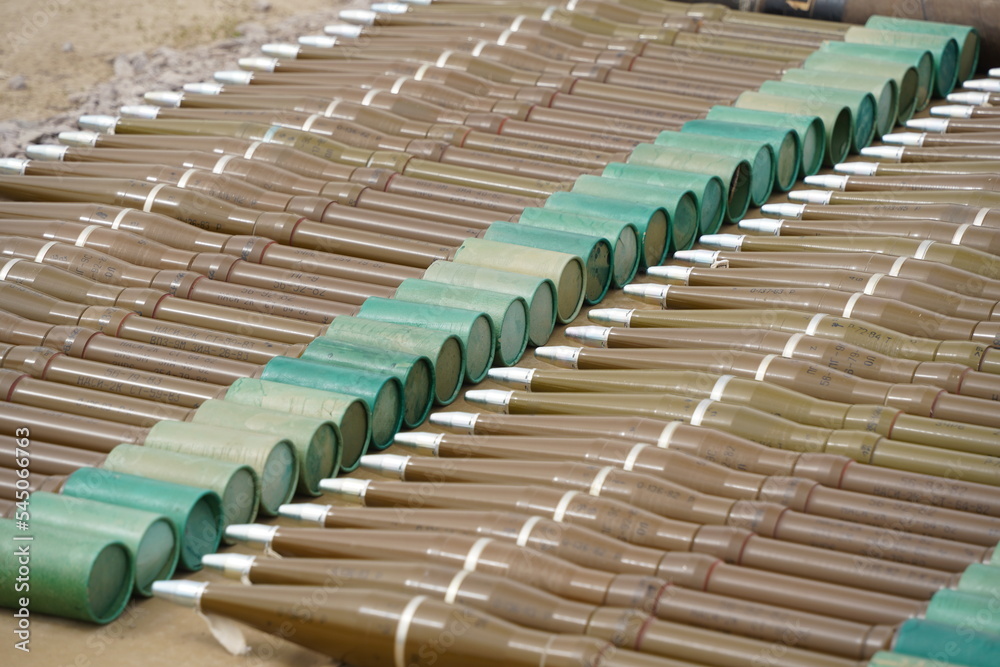 Obraz premium Almaty, Kazakhstan - 04.14.2022 : Grenades for a hand grenade launcher are laid out in a row at military exercises.