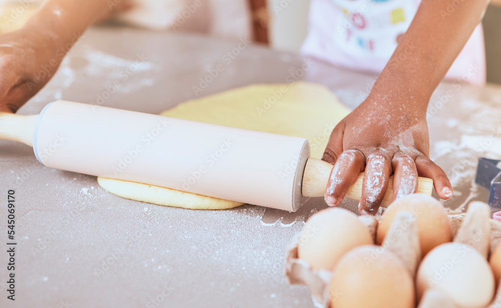 Child, baking and cooking with hands on table with rolling pin for pizza, pastry or cookie dough on messy kitchen counter with flour and eggs. Learning, hobby and girl learning skill to cook at, home