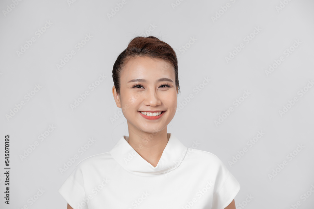 Portrait of young and cute Asian woman with smiling face pose to camera with positive gesture. Portrait of young and cute Asian woman with smiling face pose to camera with positive gesture.