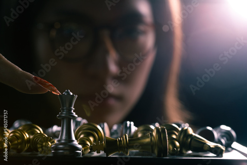 Bild auf Leinwand Business woman play queen Chess with close up finger nail