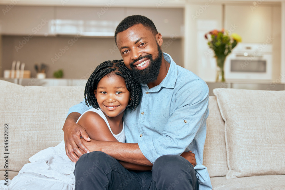 Hug, happy and portrait of a girl with her father on the living room sofa to relax together in a house. Family, love and African dad hugging his child with care and a smile on the couch in their home Hug, happy and portrait of a girl with her father on the living room sofa to relax together in a house. Family, love and African dad hugging his child with care and a smile on the couch in their home