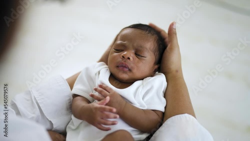 Close up mother hands holding newborn african black baby, copy space background banner family concept, Family love newborn healthcare medical concept.