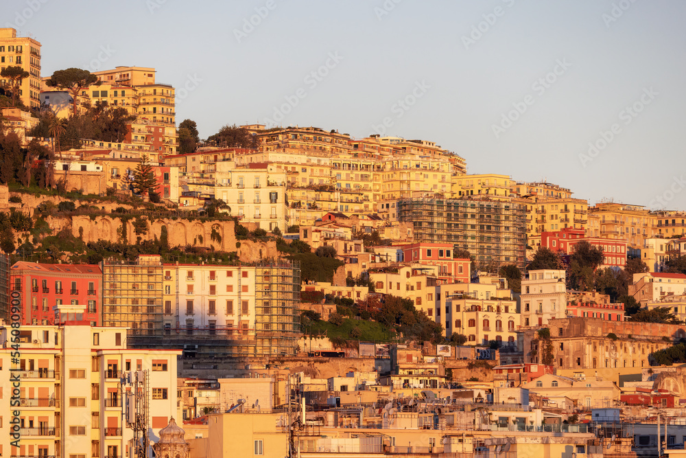 Fototapeta premium Residential Apartment Home Buildings in Historic Downtown City on Mediterranean Coast of Naples, Italy. Sunrise Sky.
