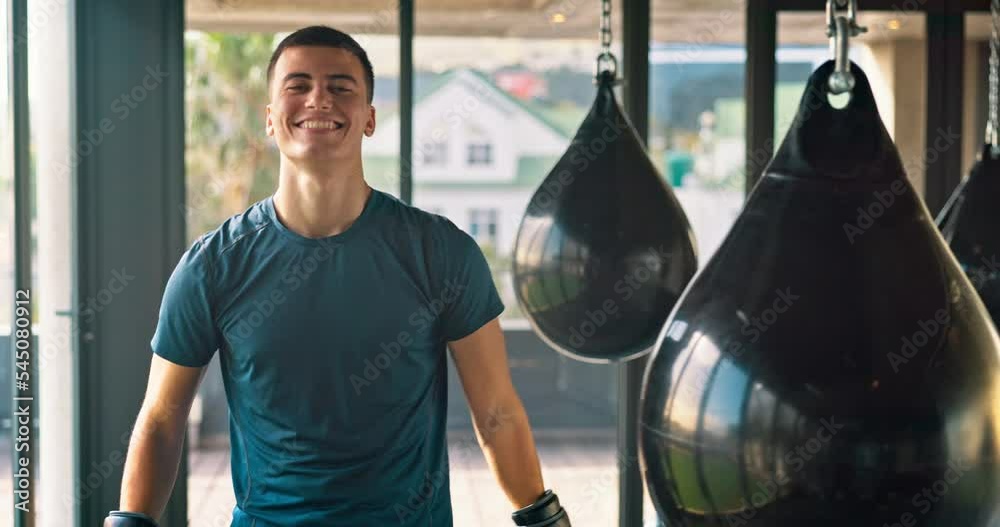 Boxer, celebrate with fitness success in gym, punching bag and bicep