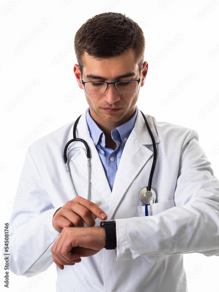 Doctor in suit with stethoscope using smart watch while isolated on white background Doctor in suit with stethoscope using smart watch while isolated on white background