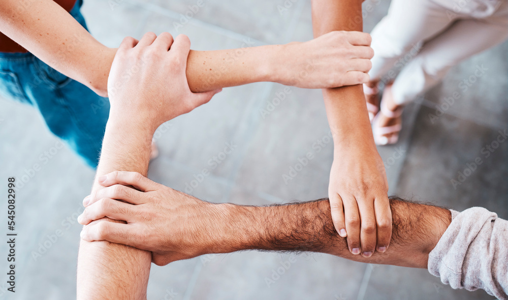 Fototapeta premium Hands, people and support with trust, teamwork and collaboration together for team goal from above. Group diversity in volunteer partnership, social solidarity or community of friends in circle arms
