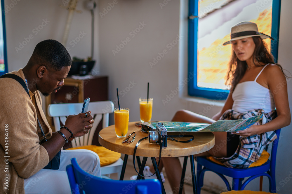 Female tourist looking at the map
