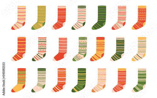 Collection of woolen christmas socks with different ornaments. Vector illustration isolated on white background