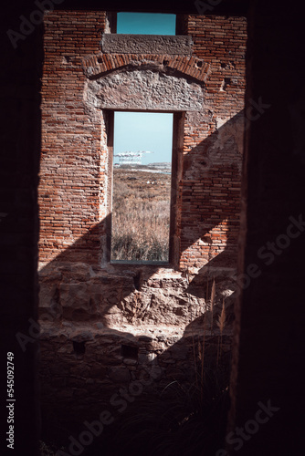 A window in an old ruined house