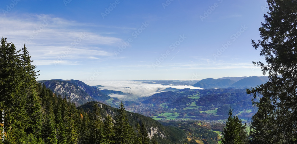 dense white fog in a deep valley view from the mountain panorama
