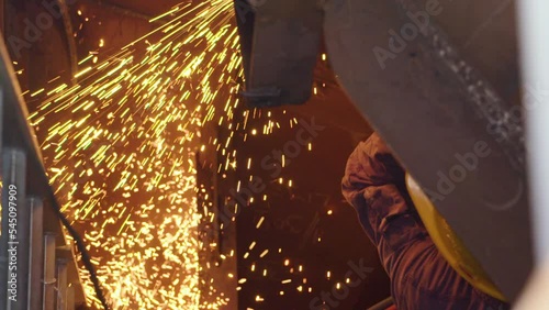 Metal cutting with oxygen acetylene torch - sparks fly photo