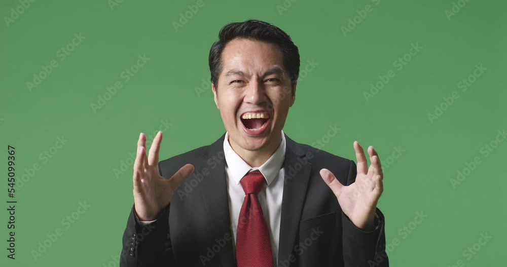 An Asian Business Man Showing Gesture Hands Palm Saying Wow And Smiling In The Green Screen Studio
An Asian Business Man Showing Gesture Hands Palm Saying Wow And Smiling In The Green Screen Studio