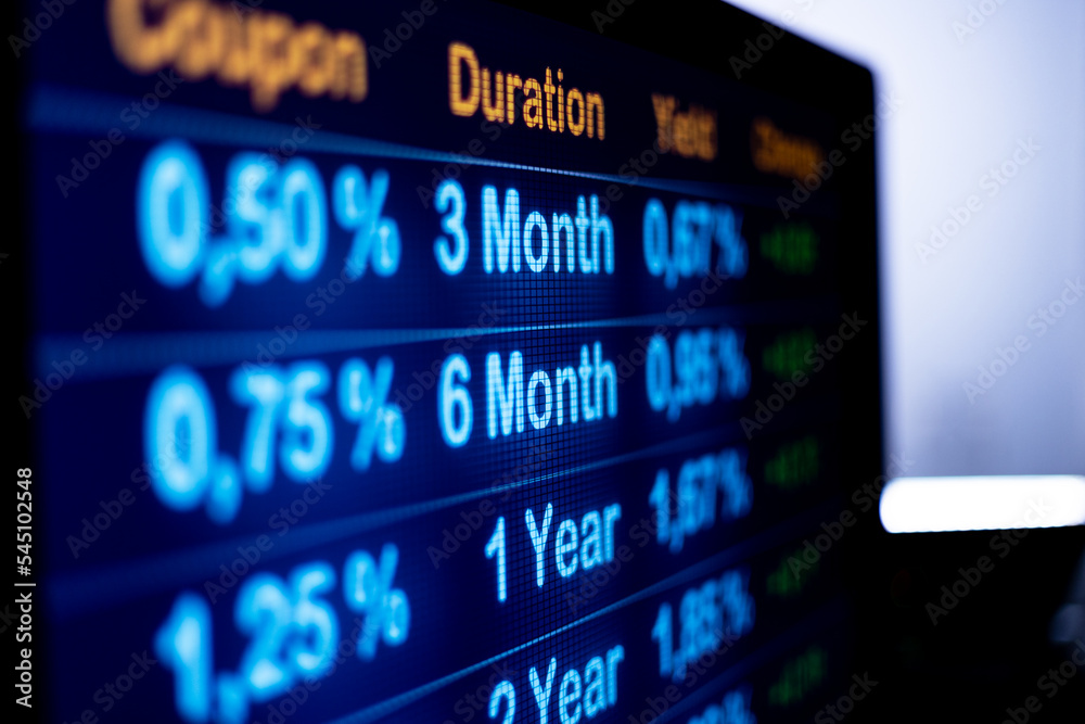 Screen with rising interest rates. Close up computer monitor with rising yields and rates. financial business, mortgage rates, debt financing and banking industry. Screen with rising interest rates. Close up computer monitor with rising yields and rates. financial business, mortgage rates, debt financing and banking industry.