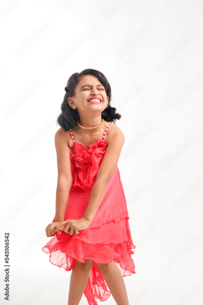 Cute indian little girl giving expression on white background Cute indian little girl giving expression on white background