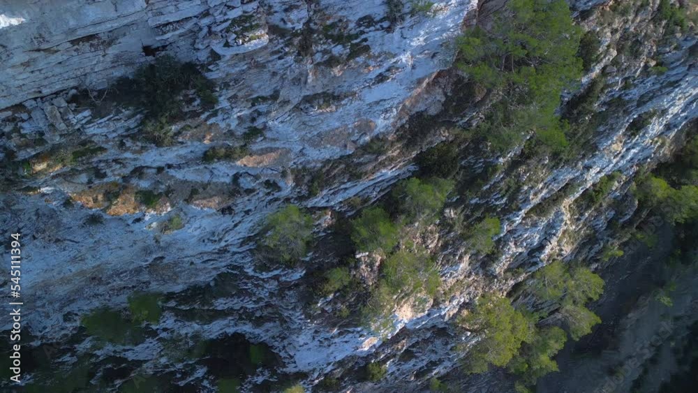 Tranquil aerial view flight tilt up drone from the abyss at ibiza mountain hike cliff edge at daytime summer 2022. 4k marnitz Cinematic Tranquil aerial view flight tilt up drone from the abyss at ibiza mountain hike cliff edge at daytime summer 2022. 4k marnitz Cinematic