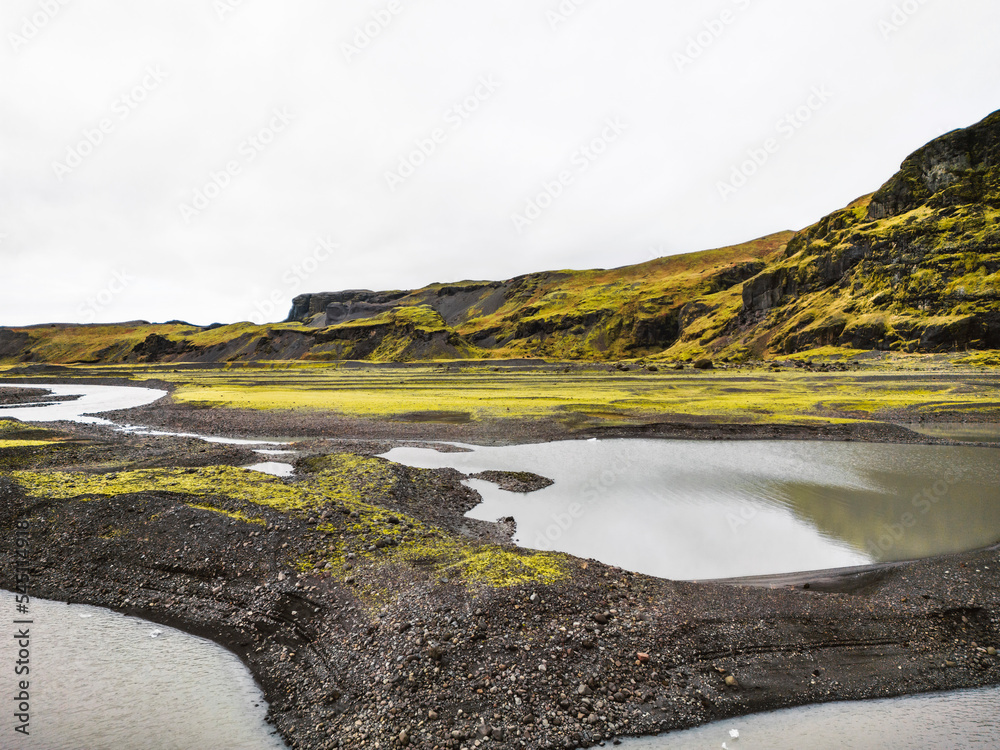 Iceland landscape, glacier lakes, mountains behind, overcast weather