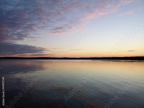 Sunset on a lake showing the beauty of Finnish nature