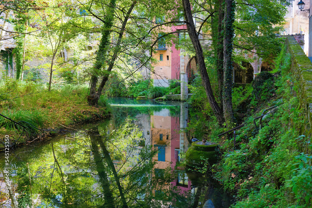 View of the Brugent river as it passes through the historic center of Sant Feliu de Pallerols, Garrotxa, Catalonia, Spain View of the Brugent river as it passes through the historic center of Sant Feliu de Pallerols, Garrotxa, Catalonia, Spain