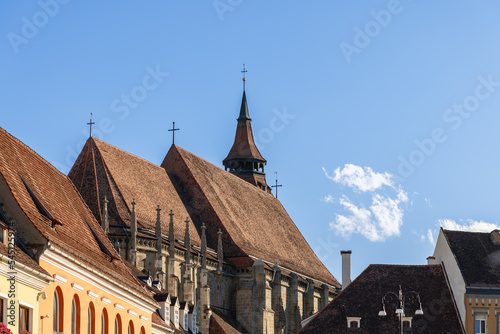 The tiled roof of medieval Black Church (Biserica Neagra) was built by the Saxon (German) community and represents main Gothic-style monument in Brasov in south-eastern Transylvania, Romania  photo