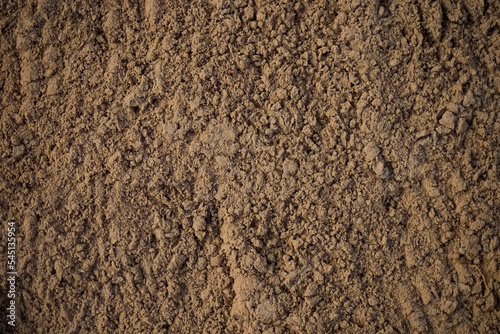 River sand. Blank textured surface. Background with space to copy. Building material..
