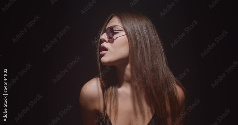 Sensual girl dancing isolated on black Sensual girl dancing isolated on black