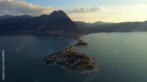 Aerial view of Egirdir lake, island and village. Landscape with a small turkish town among the lake under the mountain photo