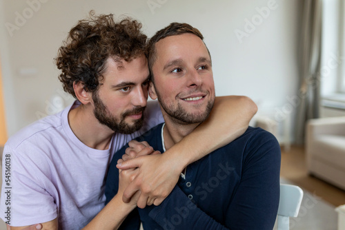 Two young man lgbtq gay couple dating in love hugging enjoying intimate tender sensual moment together kissing with eyes closed © Graphicroyalty
