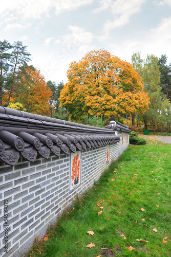 Korean traditional garden in Hryshka National Botanical Garden of the National Academy of Sciences of Ukraine in autumn time in Kyiv	
 photo