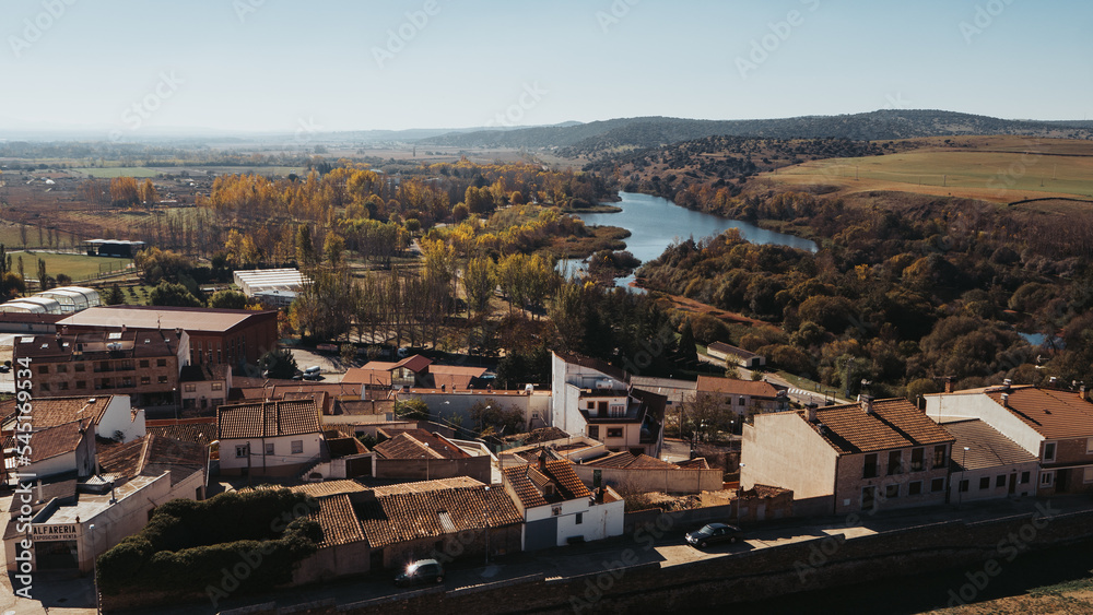 Landscape of a village with autumn colors. Drone view
