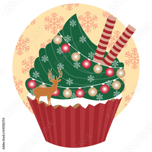 A Christmas tree cupcake with Christmas decorations