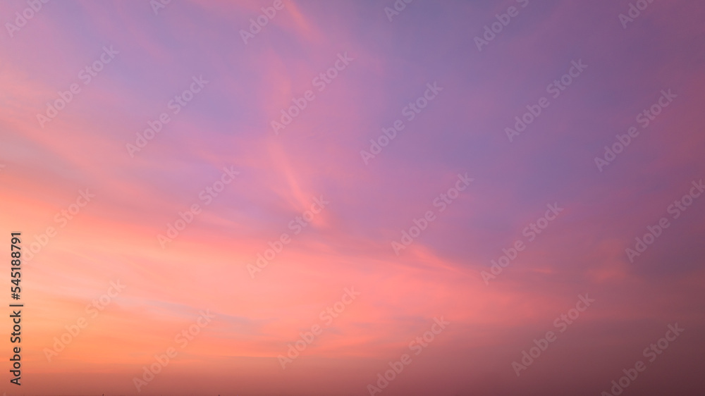 Twilight sky with effect of light pastel tone. Colorful sunset of soft clouds for background abstrac concept,