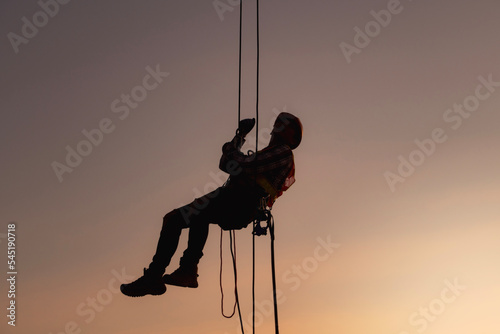 rope access, foreman operation control training the abseiling from the height silhouette