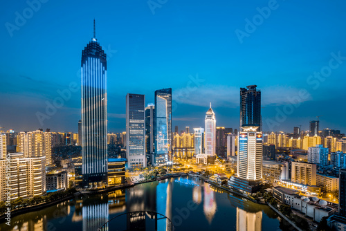 Night view of CBD buildings in Hankou Northwest Lake  Wuhan  Hubei  China