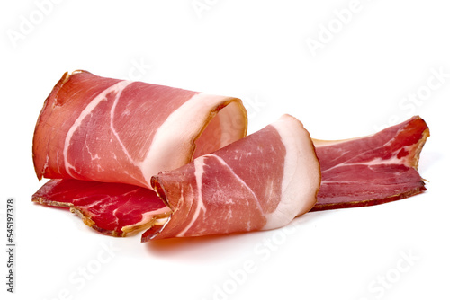 Italian prosciutto crudo or spanish jamon. Jerked meat, isolated on white background. High resolution image. photo