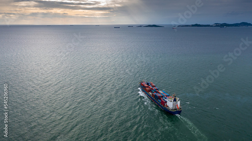 Aerial view container cargo ship global business logistic transportation import export container box, Container cargo ship boat freight shipping maritime commercial port, Cargo vessel industrial port. © Darunrat