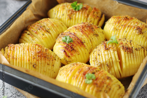 Hasselback potatoes - typical Swedish cuisine	 photo